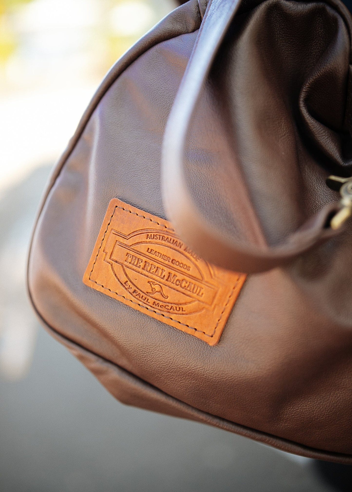 The Real McCaul Travel Bag Duffel Carry All Bag - Cowhide - Chestnut Australian Made Australian Owned Large Overnight Travel Duffel Bag Leather Made in Australia