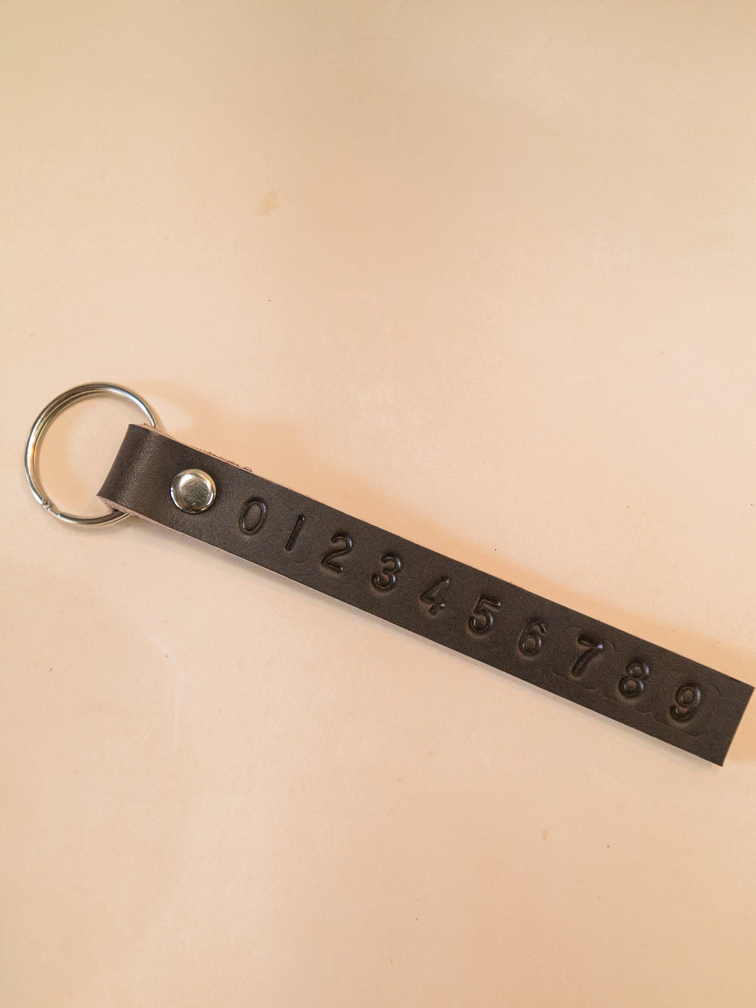 The Real McCaul Leathergoods Keyring Dark Brown Phone Number Leather Keyring Australian Made Australian Owned Personalised Leather Name Keyring Australian Made