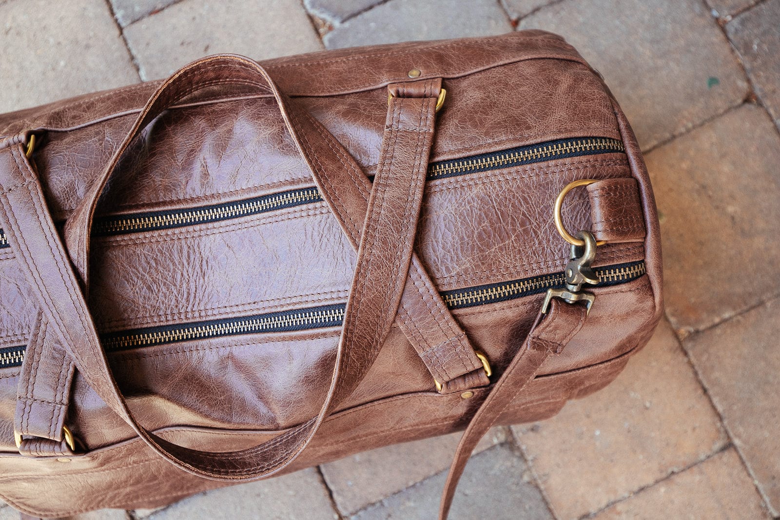 The Real McCaul Travel Bag Classic Overnight Travel Bag - Cowhide - Premium Marble Brown Australian Made Australian Owned Large Overnight Travel Duffel Bag Leather Made in Australia