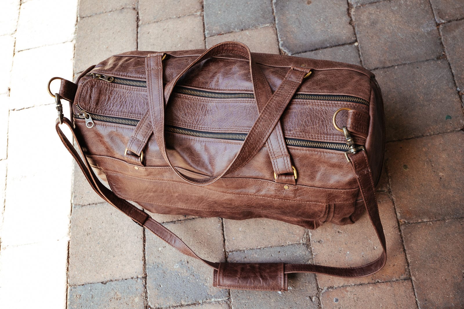 The Real McCaul Travel Bag Classic Overnight Travel Bag - Cowhide - Premium Marble Brown Australian Made Australian Owned Large Overnight Travel Duffel Bag Leather Made in Australia