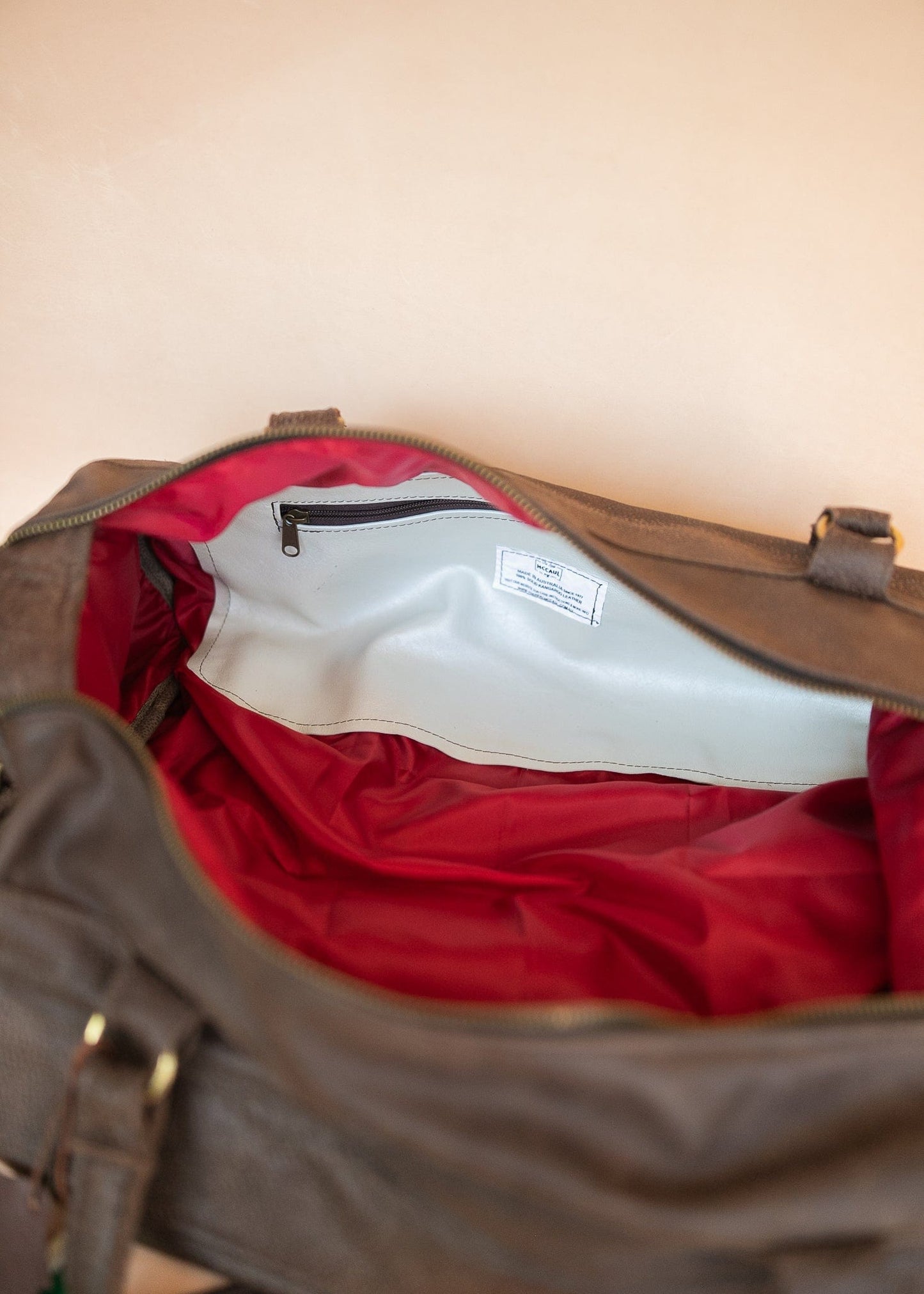 The Real McCaul Travel Bag Classic Overnight Travel Bag - Cowhide - Premium Marble Brown Australian Made Australian Owned Large Overnight Travel Duffel Bag Leather Made in Australia