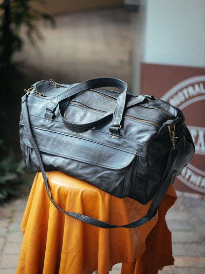 The Real McCaul Travel Bag Black Classic Overnight Travel Bag - Cowhide Australian Made Australian Owned Large Overnight Travel Duffel Bag Leather Made in Australia