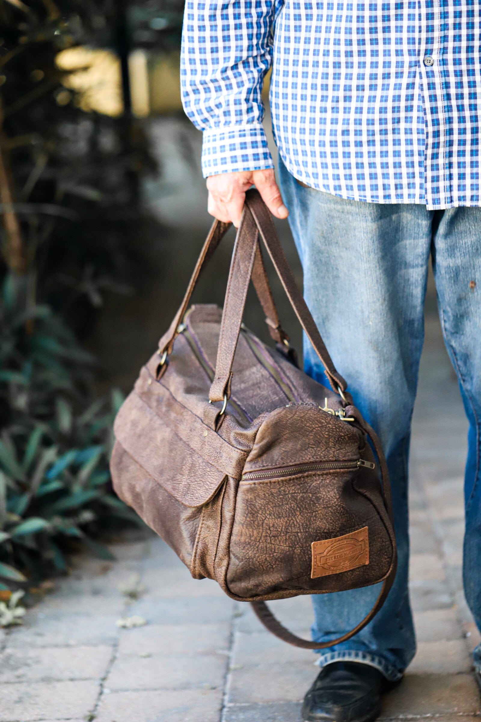 The Real McCaul Travel Bag Small Classic Overnight Travel Bag - Cowhide Australian Made Australian Owned Large Overnight Travel Duffel Bag Leather Made in Australia